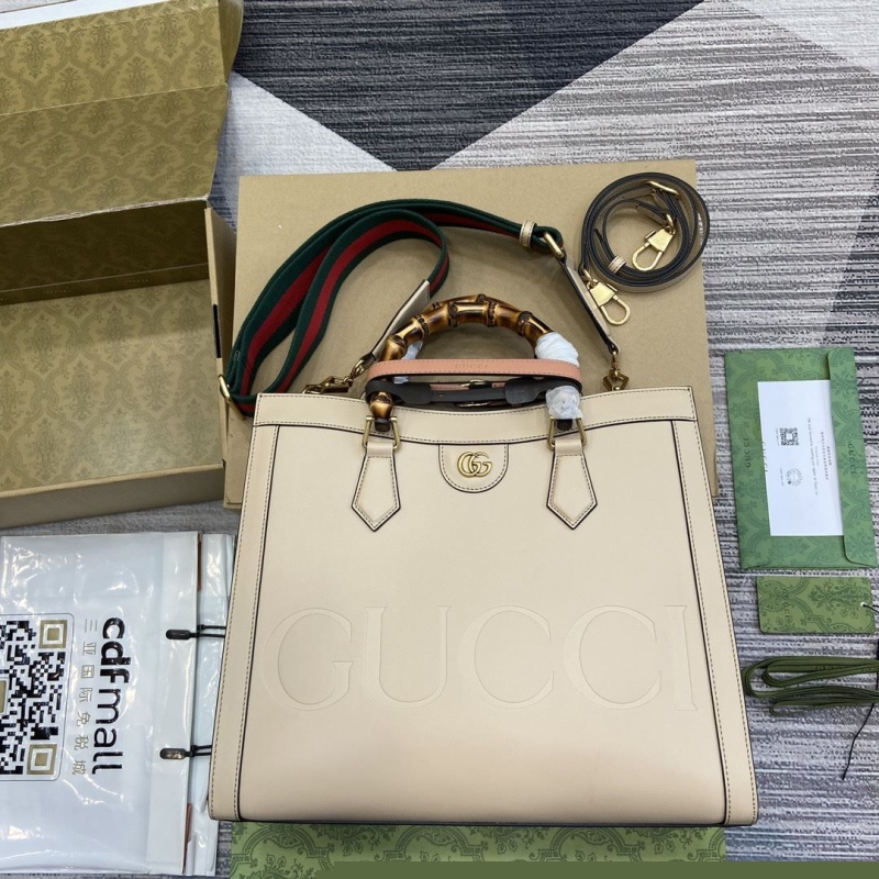 G*u*i top handle bags